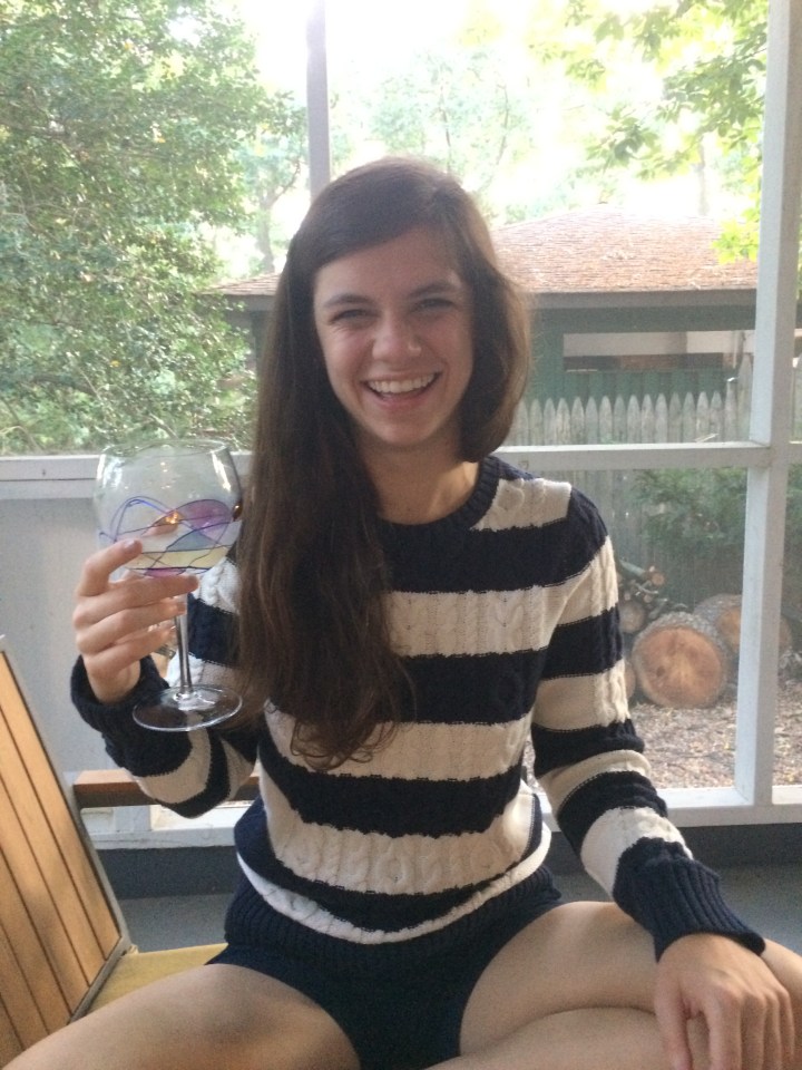 A great preppy shorts and sweater outfit for September