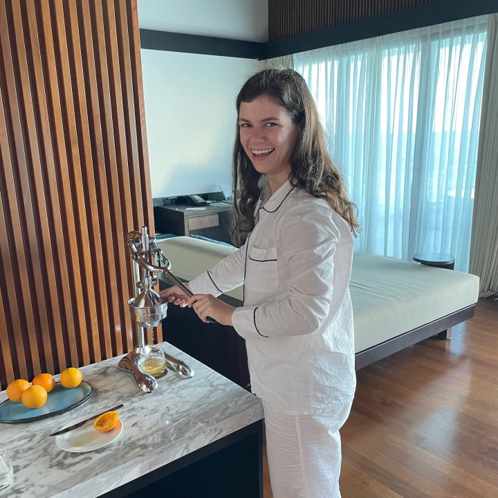 Using the in-room orange juicer